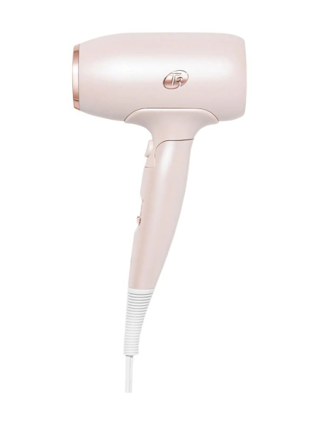 T3 Afar Lightweight Travel Size Hair Dryer mini pale pink hair dryer on white background